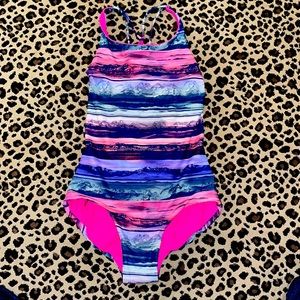 Girl’s reversible pink Ivivva swimsuit Size 7/8